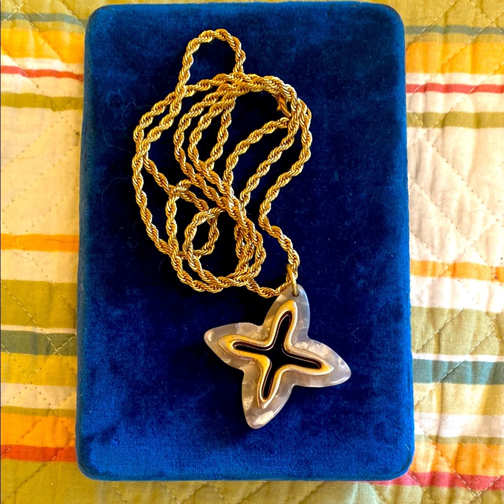Louis Vuitton flower charm reimagined on vintage rope chain.